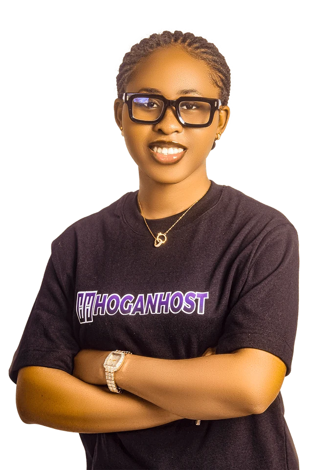 A smiling member of the HoganHost team wearing a HoganHost shirt